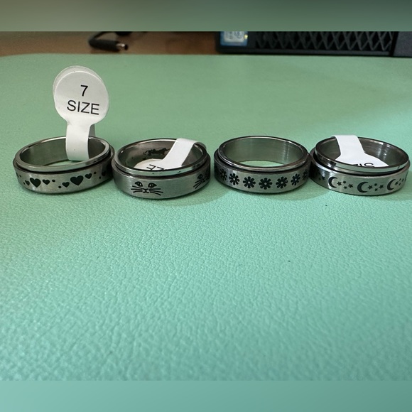 8 spinner rings size 7 - Picture 2 of 3